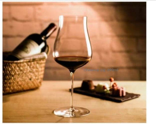 Modern crystal glass next to a decanter