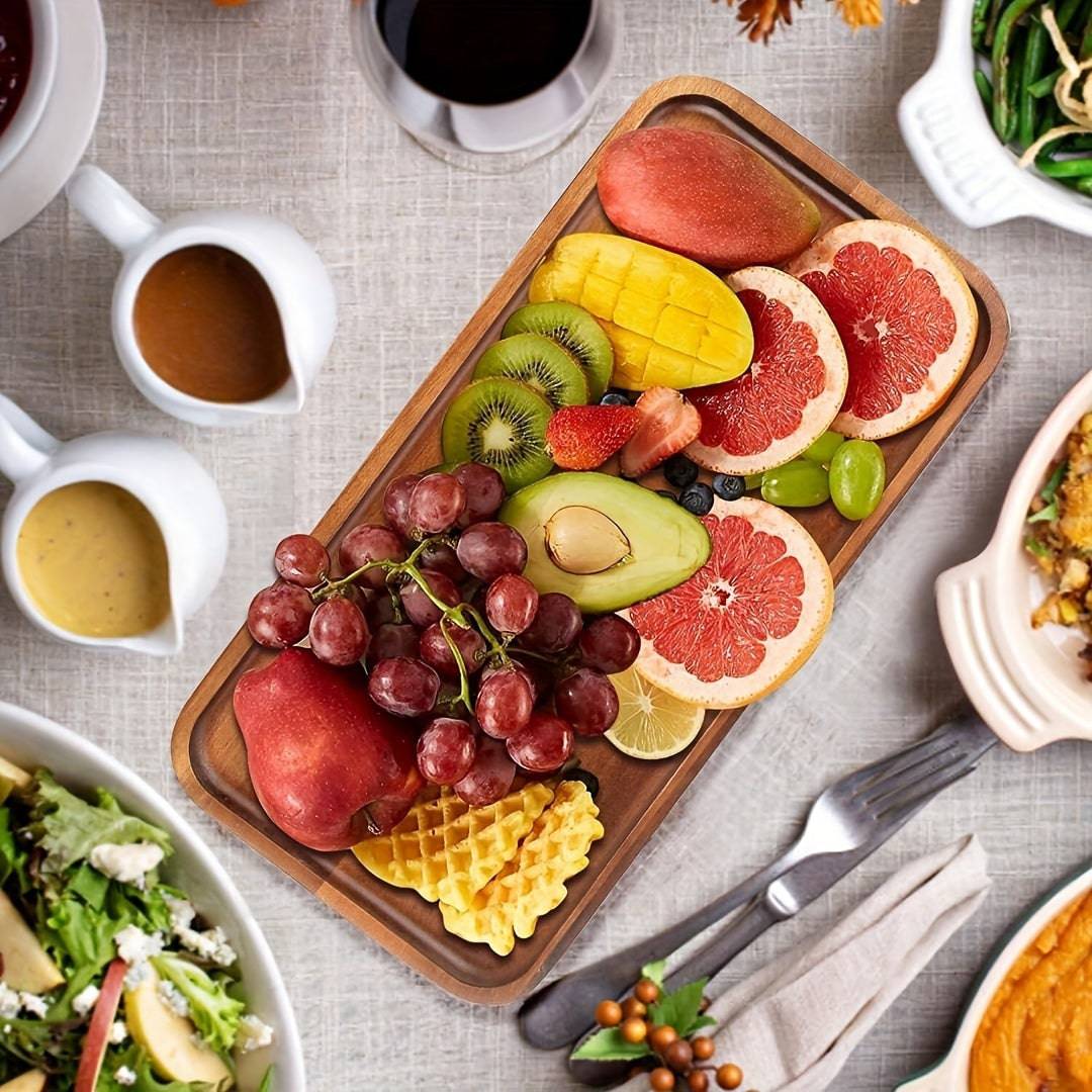Stylish wood tray filled with snacks and beverages for party hosting