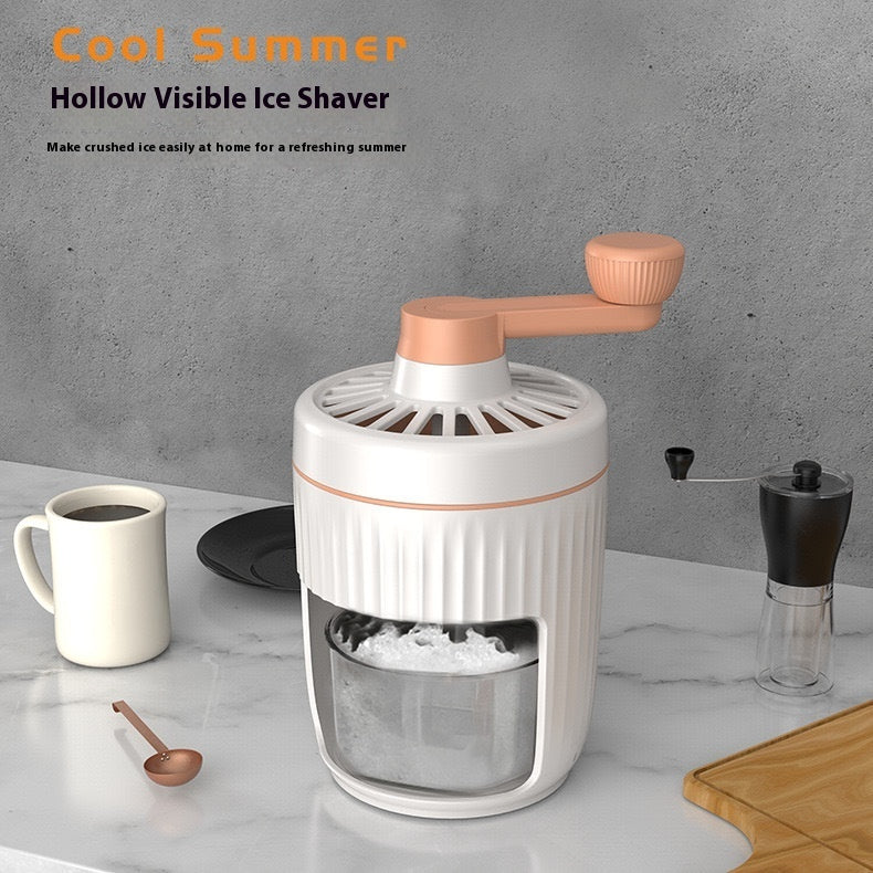 Hollow visible ice shaver on a marble surface with a cup of coffee and a pepper grinder.