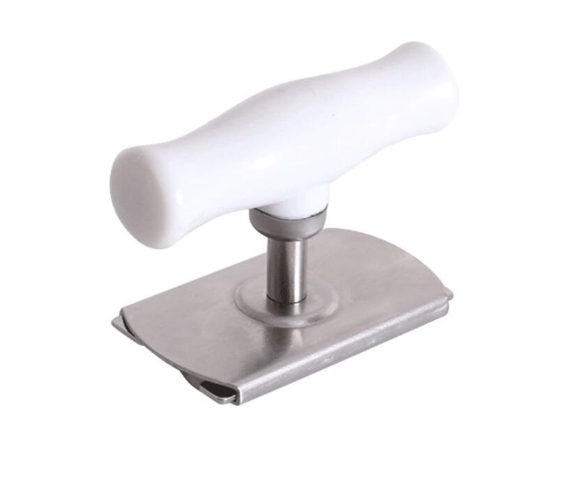Door handle with white ceramic knob and metallic base on a white background