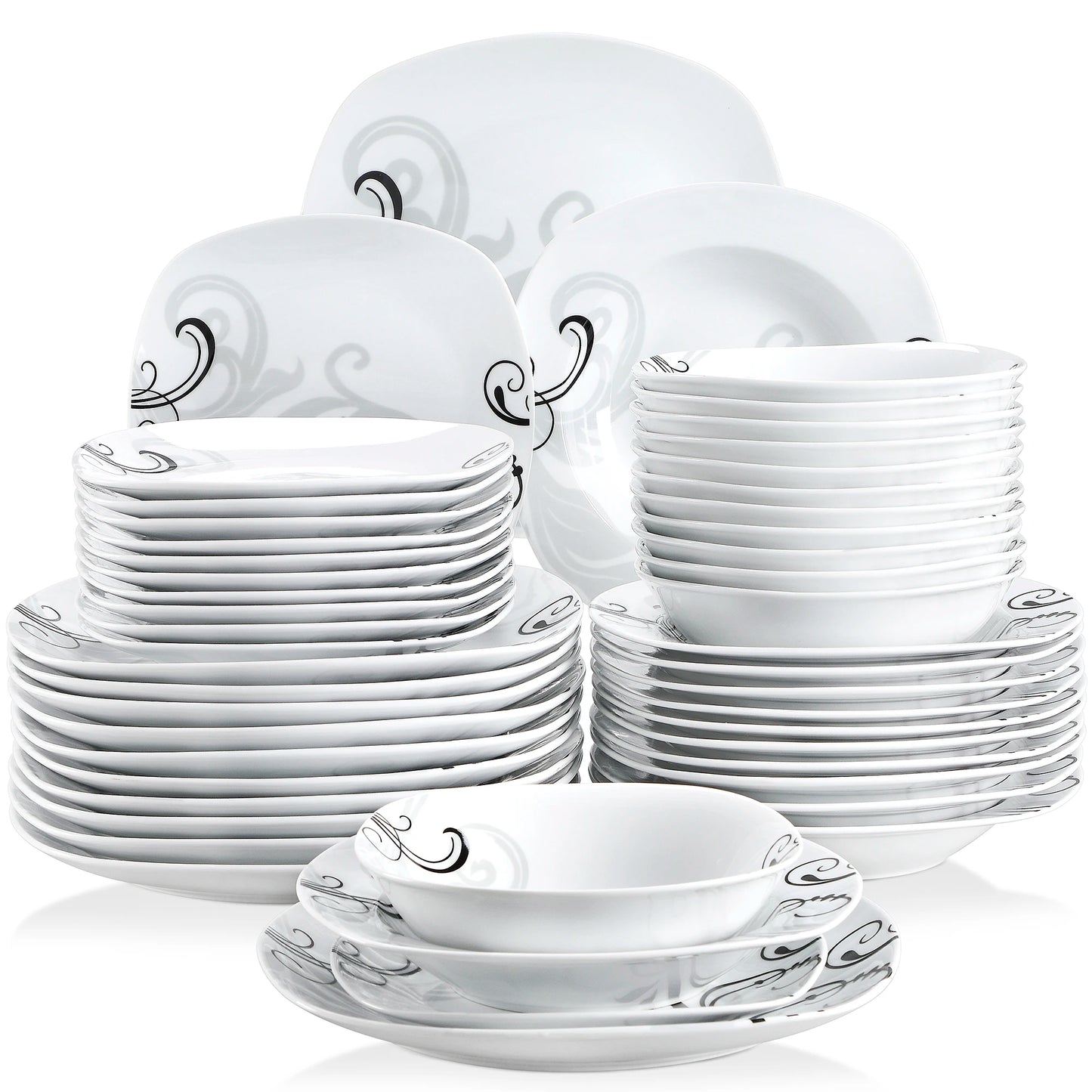 Set of white ceramic dinnerware with decorative patterns on a white background