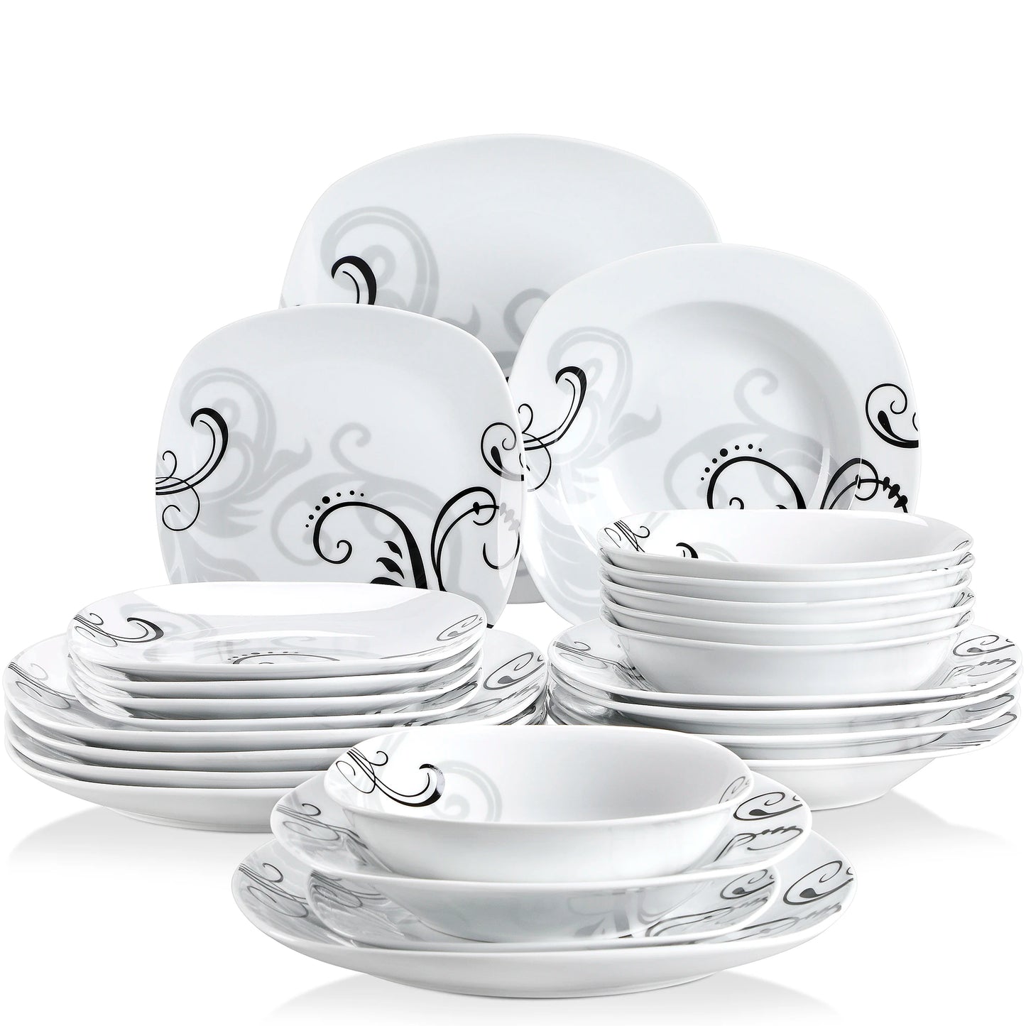 Set of white ceramic dinnerware with black patterns on a white background