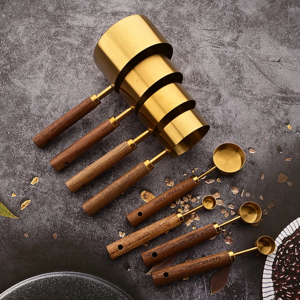 Chef-grade gold stainless steel measuring cups and spoons set.