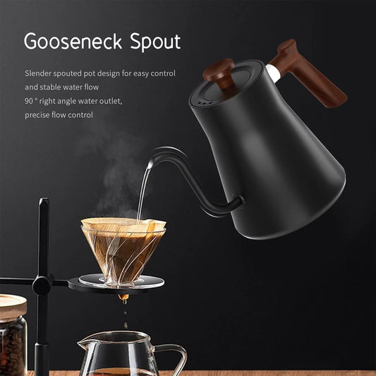 Black electric kettle with gooseneck spout pouring coffee into a filter basket on a dark background.