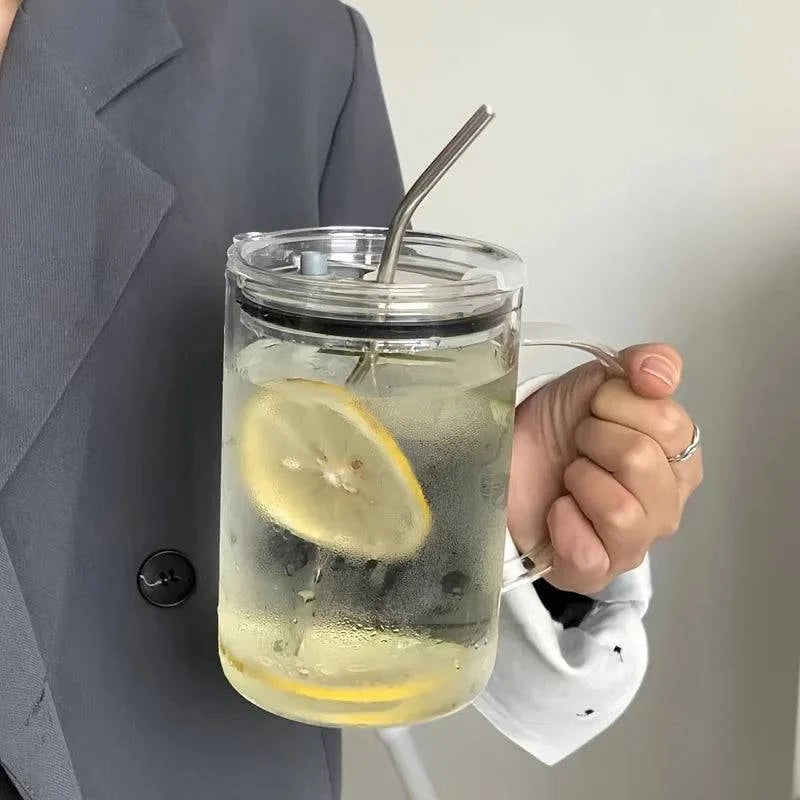 Durable glass cup with handle and secure lid for water, tea, or smoothies