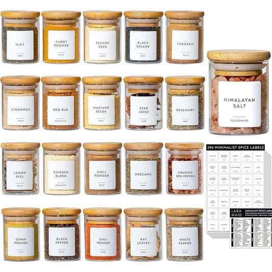 Glass spice jars with clear design for easy identification.