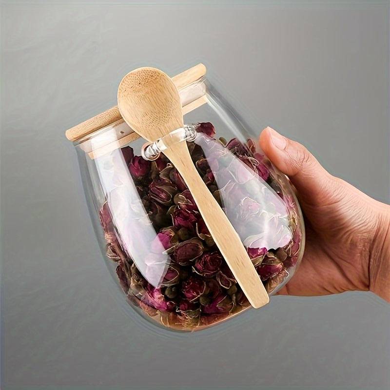 Airtight glass container with built-in spoon