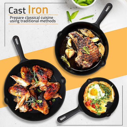 Three cast iron skillets with cooked food on a white and orange background