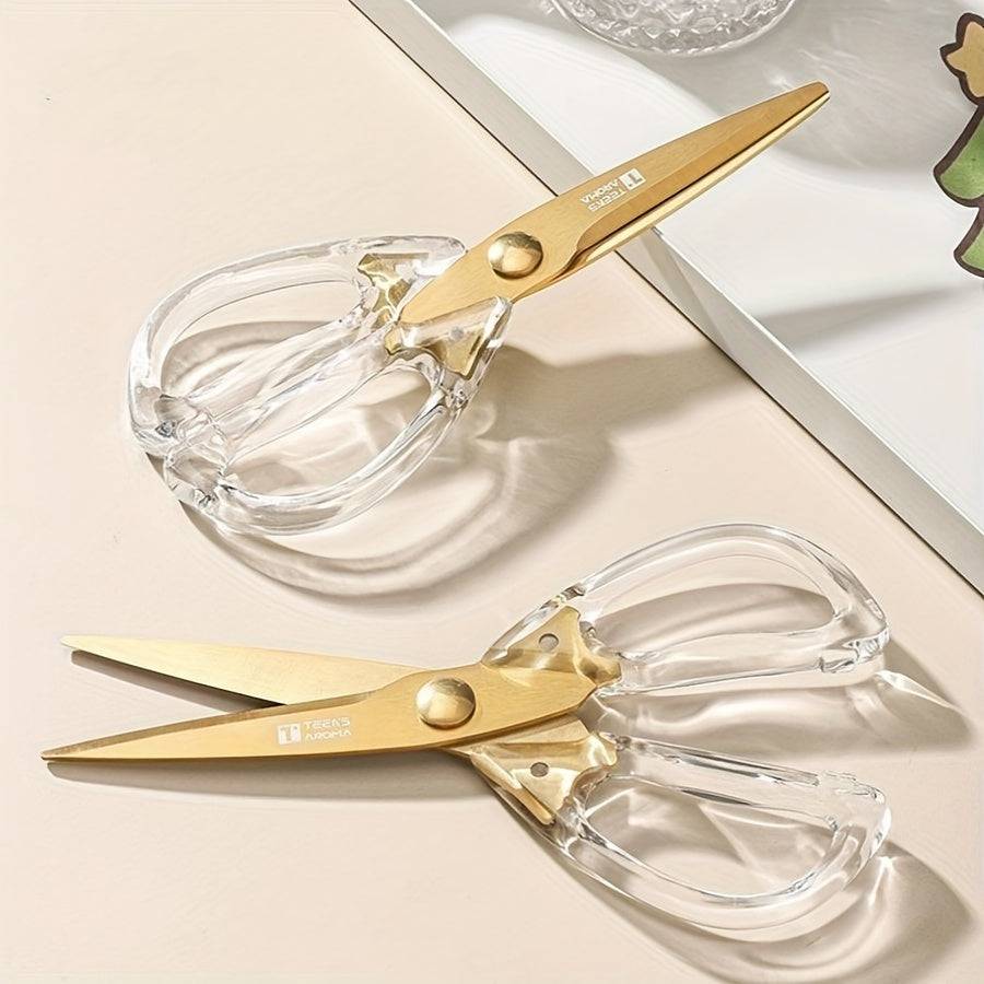 Golden-tone kitchen scissors with sharp blades for cutting meat and vegetables