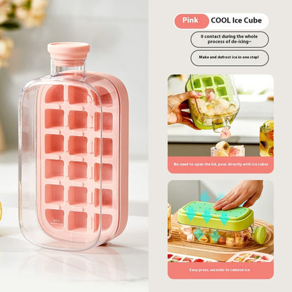 Pink silicone ice cube tray with clear lid on a white surface, accompanied by an inset showing its use.