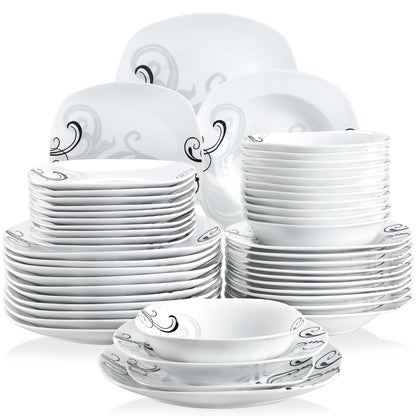 Set of white ceramic dinnerware with decorative patterns on a white background
