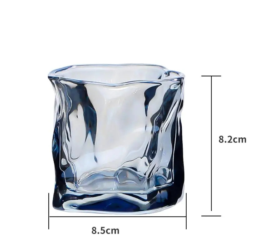 Ice blue glass mug with wave pattern