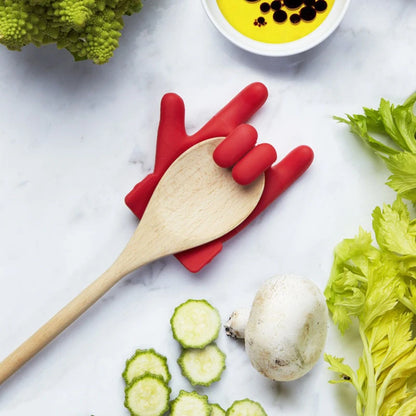 Side view showing the compact size and ergonomic design of the silicone spoon rest.