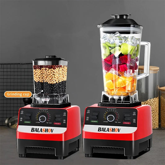 Two Balashov blenders, one with a grinding cup and the other with fruits and vegetables, on a dark background.