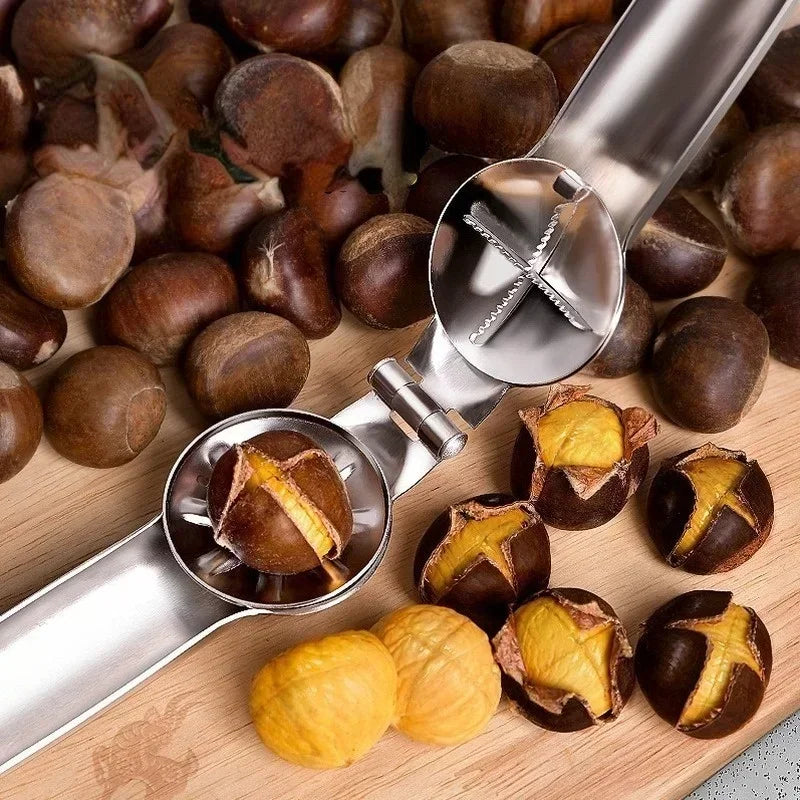 Stainless steel kitchen tool for cracking hard-shelled nuts.