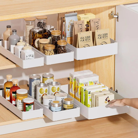 Kitchen cabinet with organized shelves containing various food items and containers.